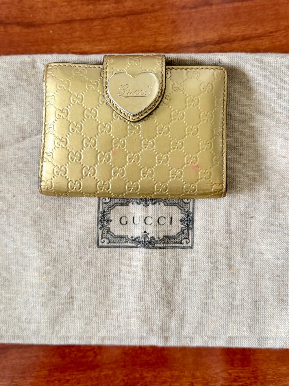 Gucci Metallic Gold Compact Wallet with Heart Tab